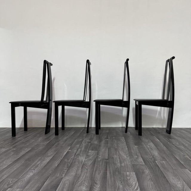 An elegant set of four original postmodern chairs from the 1980s, featuring clean lines and a sculptural aesthetic typical...