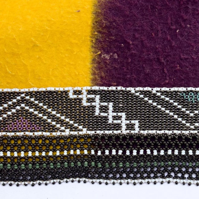 In Ndebele culture, the nguba is a significant symbol of womanhood, marriage, and heritage. This beaded blanket is...