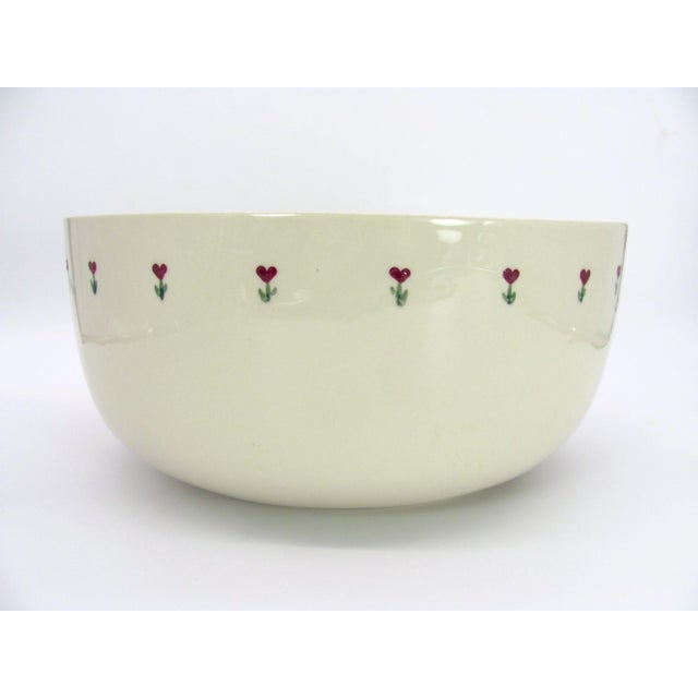 Red heart flowers adorn the inside and outside rim of this extraordinary showpiece. Weighing in at 6 pounds, this...