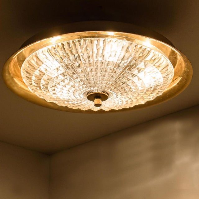 Wonderful flush mount made by fagerlund, sweden. From around 1960. Consists of a beautiful crystal handmade glass plate on...