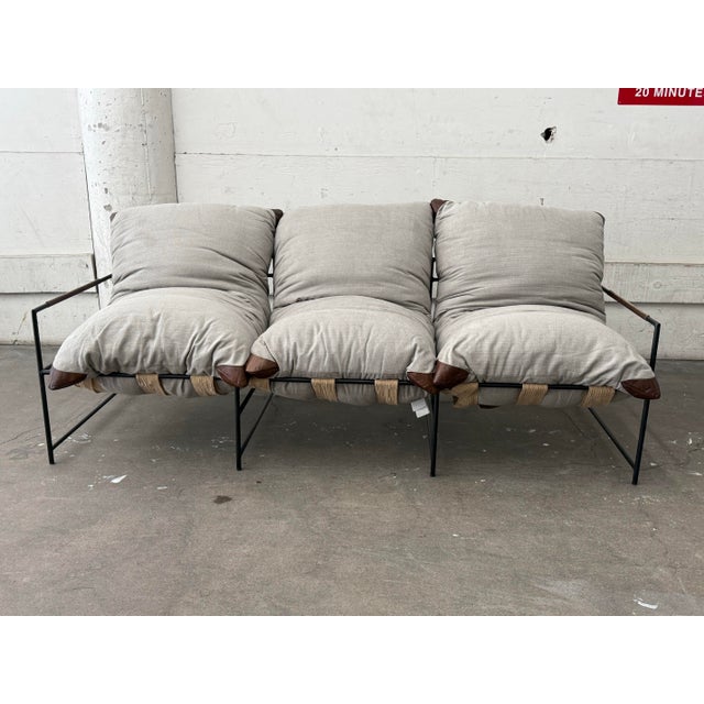 Design Plus Gallery presents the Palermo Sofa by Classic Home. Upholstered in a natural-toned polyester-blend fabric, the...