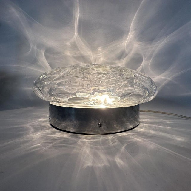 Dimensions: 30 cm Diameter, 14cm H Material: Glass, Metal Color: Silver, transpirant Up to 250V (Europe/UK Standard).The...