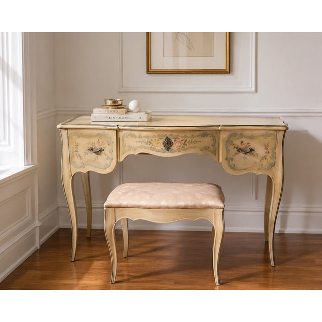 A charming vintage vanity and matching bench designed by Ralph H. Widdicombe for the John Widdicomb Company of Grand...