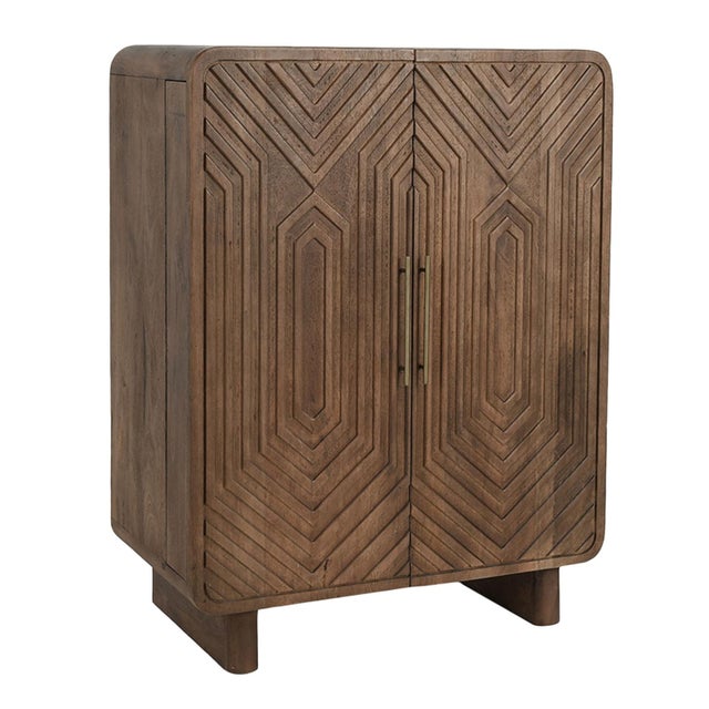 Deco style mango wood bar cabinet with beautiful carved design on two front doors. Sleek brass finish handles. Each may...