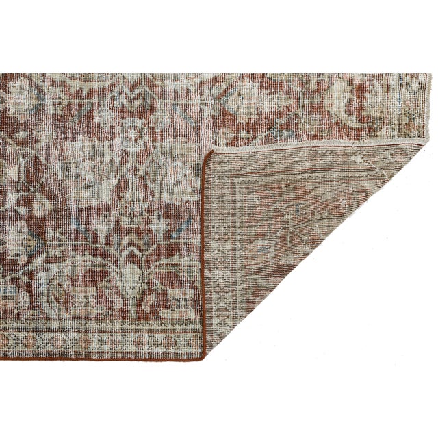 Elevate your interior with the quiet luxury of this authentic 19th-century Antique Malayer wool runner rug. Celebrated for...