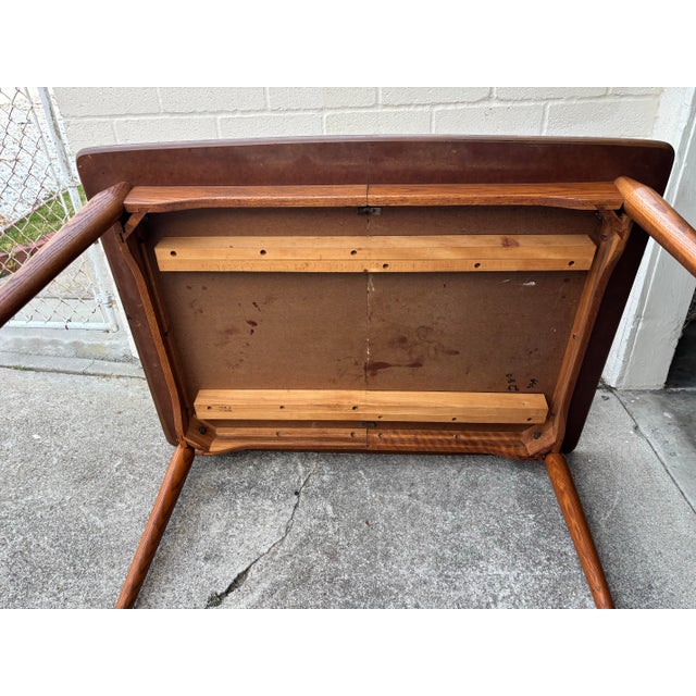 Wood Vintage Mid-Century Modern Wood and Formica Dining Table Featuring Tapered Legs With Metal Tips. For Sale - Image 7 of 11