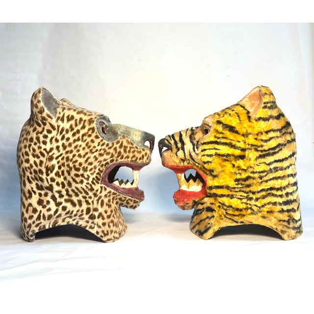 Wild expressionistic hand painted vintage papier-mâché masks (wearable!) of a tiger and cheetah/jaguar. With beautiful...