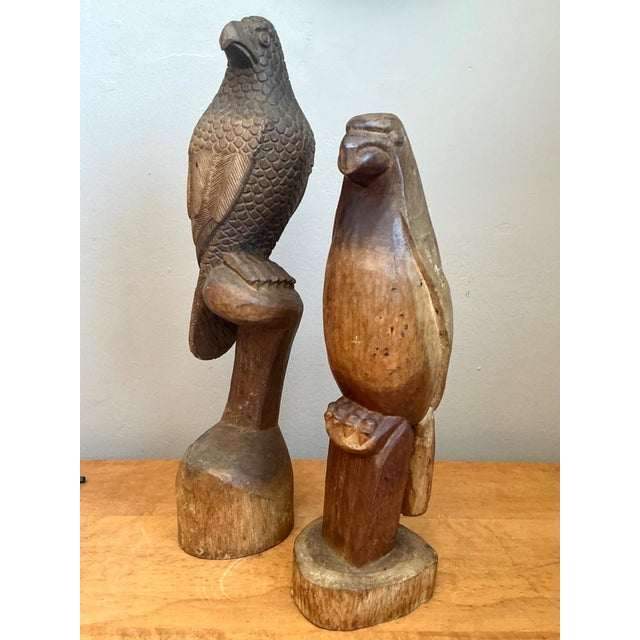 This captivating pair of hand-carved hardwood bird sculptures offers a sophisticated blend of mid-century rustic charm and...