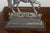 A pair of English silver toned metal prancing horses from the early 20th century, perfect to be used as bookends. Created...