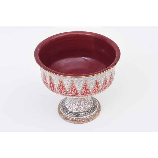 This lovely vintage Italian ceramic pedestal bowl has a textured lava pebbled glaze. It was designed by Fratelli...