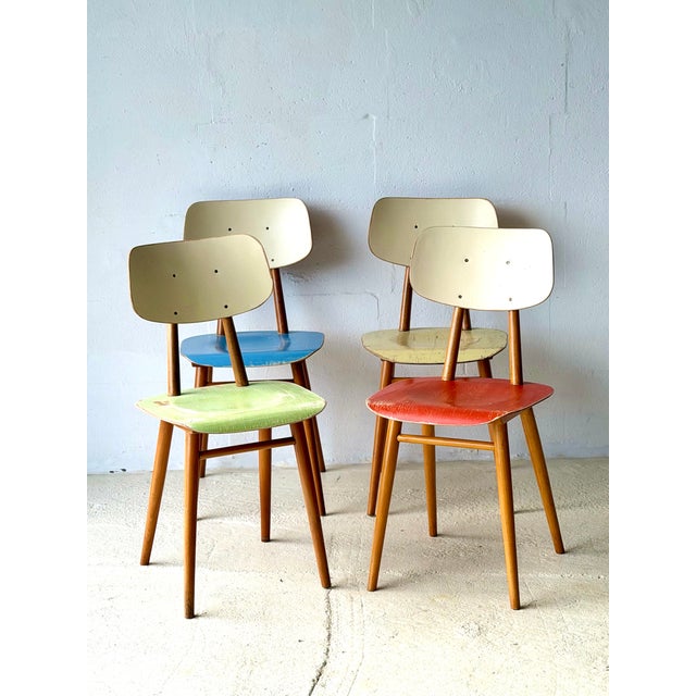 TON chair with a seat height of 44.5 cm, color-matched, manufactured in the 1960s, made of ash wood. This piece has an...