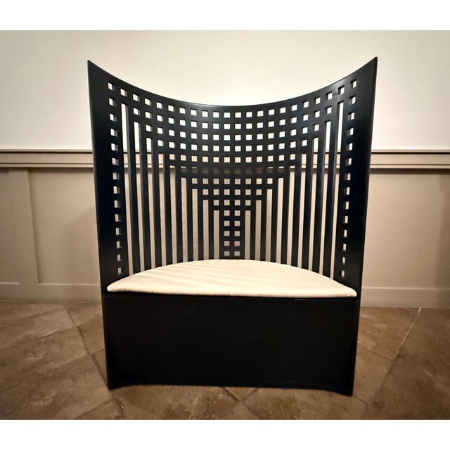 Designed by Scottish architect Charles Rennie Mackintosh in 1904 for the Willow Tea Rooms in Glasgow, this throne-like...