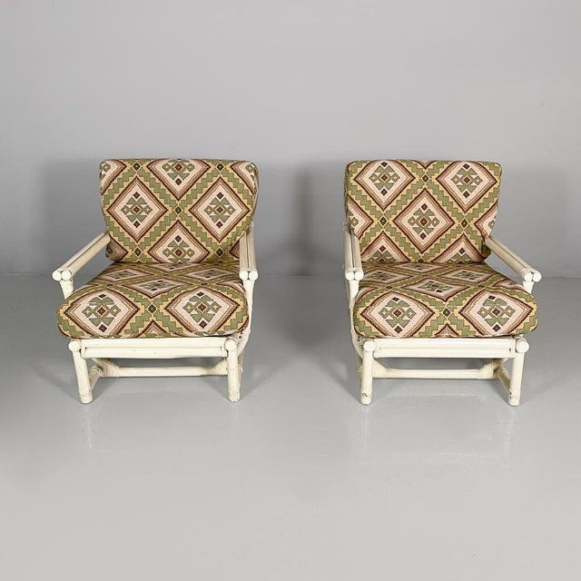 American modern armchairs by Lyda Levi for McGuire Company, 1970s Pair of armchairs with padded seat and back cushions...