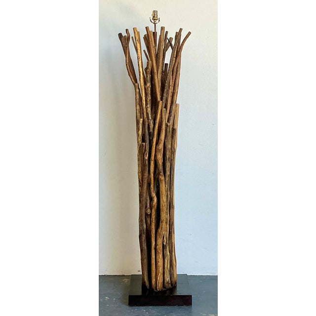 This distinctive vintage floor lamp by Palecek is a striking expression of organic design and artisanal craftsmanship....
