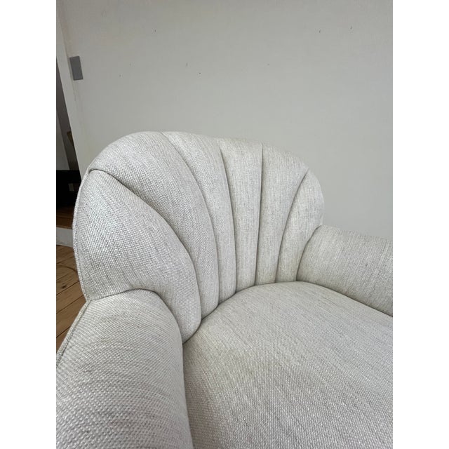 Kravet Beaumont dining arm chair designed by Larry Laslo, featuring an elegant sculptural silhouette with a distinctive...