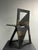 Striking foldable chair from the Eindhoven design academy circle, circa 1980s. Constructed from painted wood panels and...