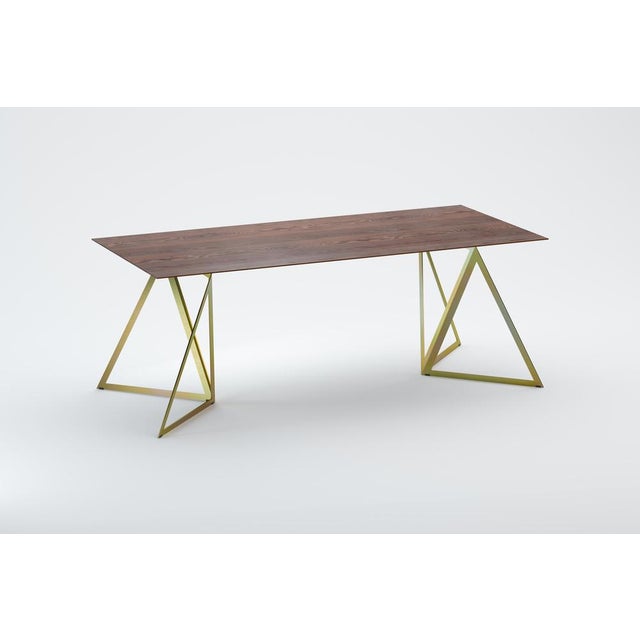 Steel stand table 200 walnut by sebastian scherer. Dimensions: d200 x w90 x h74 cm. Materials: walnut, steel, wood. Also...