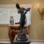 A timeless decor piece that adds elegance and romance to any indoor space. Antique reproduction bronze statue with black...
