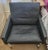 A sophisticated and rare pair of authentic 1988 Danish modern lounge armchairs by Fritz Hansen. Upholstered in premium...
