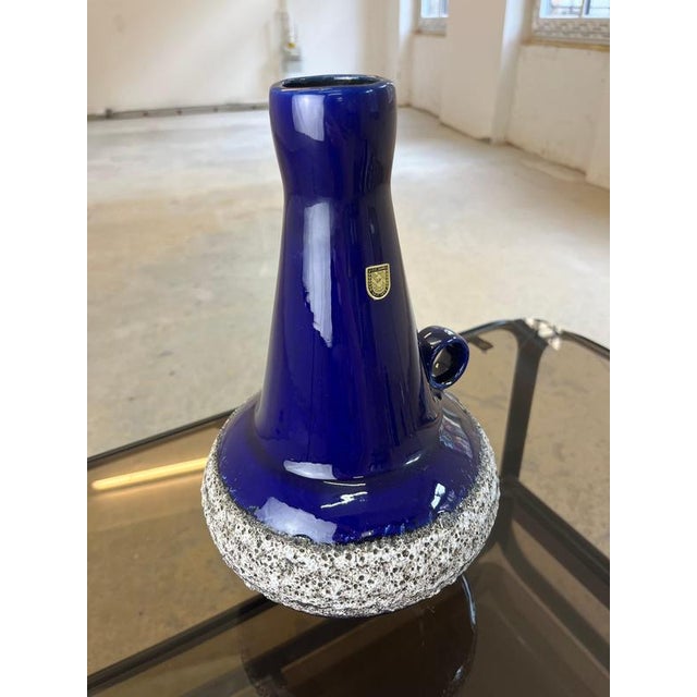 This Fat Lava vase by Fohr Keramik (model number 408-39) is a powerful statement of German mid-century design. Its carafe-...