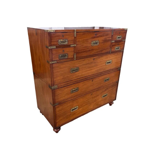 Campaign secretary chest hand-made in England in the early 1800s using mahogany. This is a beautifully-made chest that...