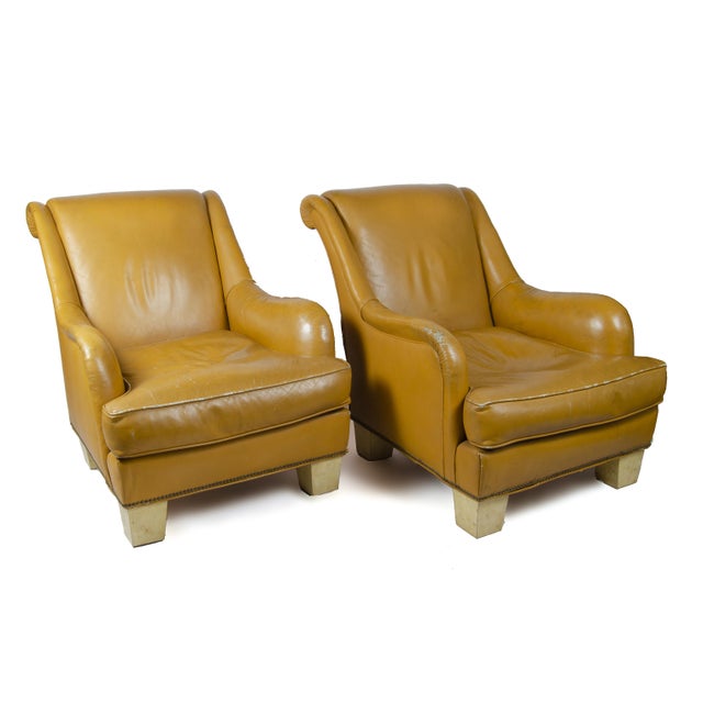 Pair of 1940s Mid-Century Modern leather club chairs with parchment paper-covered wood legs, France By unknown Material:...