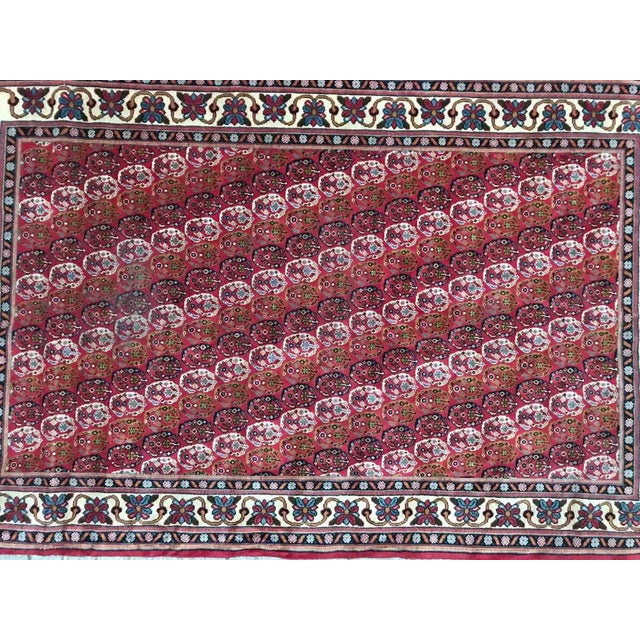 Nice 20th century Middle Eastern design rug from Transylvania, with decorative botteh design and nice colors with pink,...