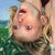 Olympic Lyla by Denise Dambrackas | Mixed-media: Acrylic & Oil on Panel of a girl doing a handstand in a field. For Sale - Image 4 of 5