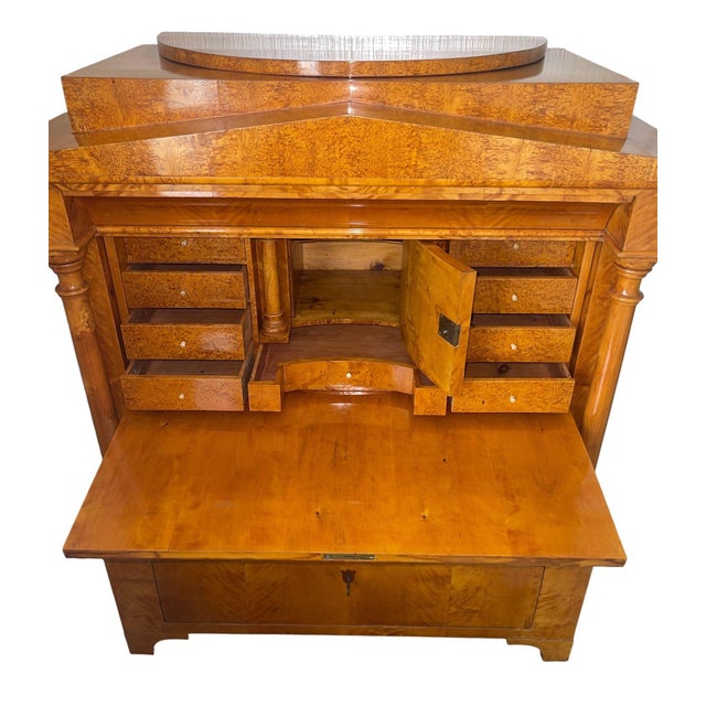 Elegant Biedermeier secretary desk, beautifully crafted with warm honey-toned figured veneers, architectural column...