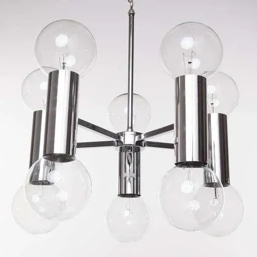 Original chrome chain and ceiling cap. Chrome frame chandelier with 10 clear glass bulbs on upper and lower tiers....