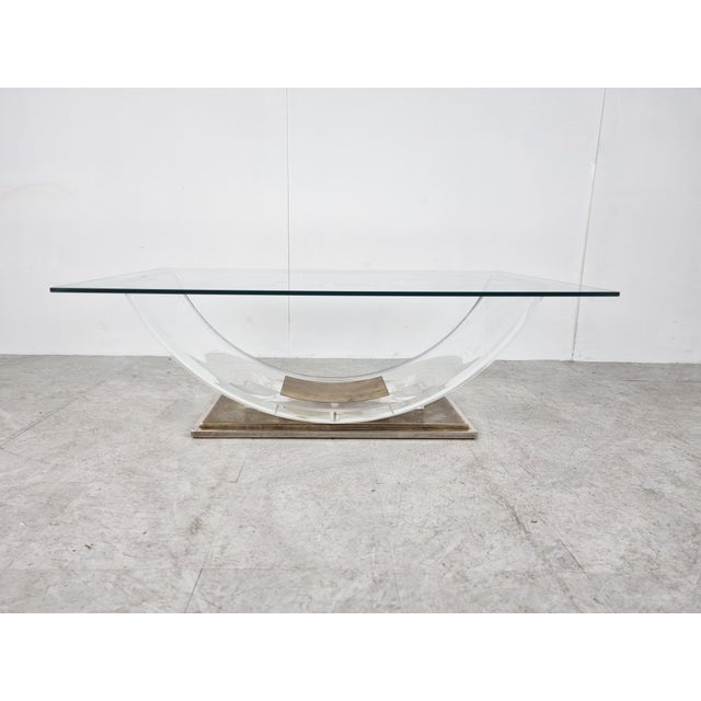 Arch coffee table with a rectangular glass top in the by Charles Hollis Jonis and made by Belgochrom. Made from an acrylic...