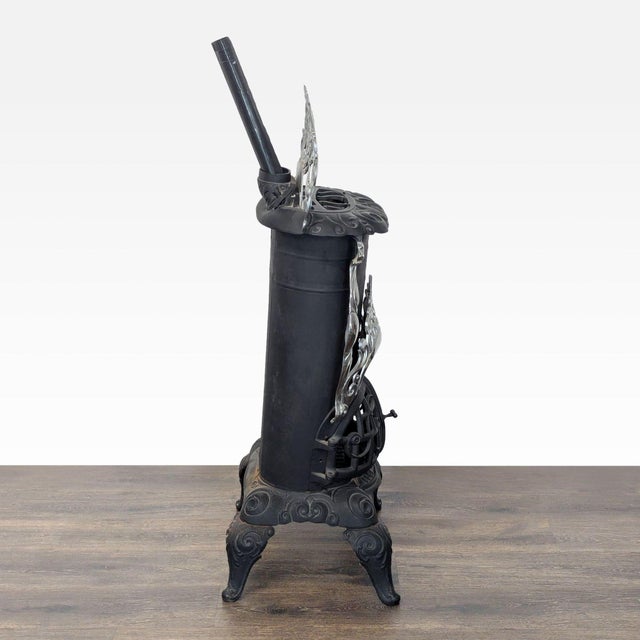 Vintage Iron Parlor Stove With Ornate Details For Sale - Image 4 of 10