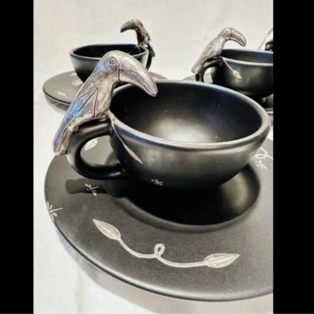 This extremely rare set of cups and saucers were purchased in Taxco, Mexico, at the artist's studio in the 1990's. One...