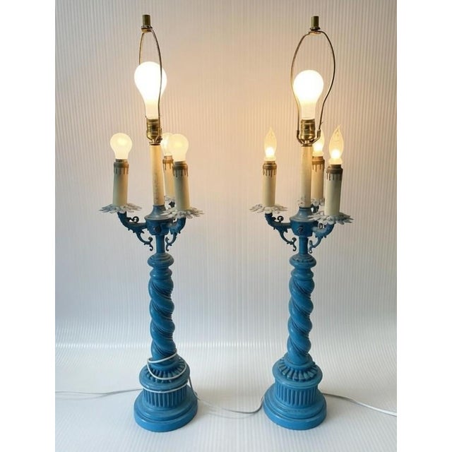 Prepare to fall in love. This exceptional matched pair of vintage barley-twist (Solomonic column) candelabra table lamps...