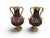 Elegant pair of French decorative vases crafted from turned red marble and enriched with finely chased gilt bronze mounts....