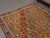Vintage Hand-Knotted runner rug is a semi-antique vintage area rug. The '70s Eastern region of Anatolia's unique rug is...