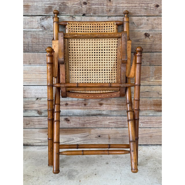 Mid-20th Century English Campaign Faux Bamboo Folding Sling Armchairs With Cane Seats – Pair For Sale In Naples, FL - Image 6 of 12