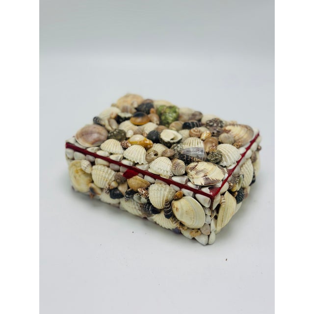 This is an older piece, probably 1960’s, original shell art box. Hand made and preserved nicely