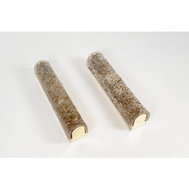 Beautiful and high-quality pair of Murano glass wall lamps on brass frames by Hillebrand. Both in perfect condition...