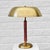 A graceful Swedish modernist table lamp, model 8451, produced by the manufacturer Boréns in the 1940s. Crafted from brass,...