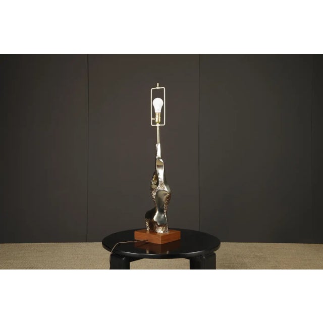 A striking sculptural table lamp by Laurel Lamp Company, dating to the 1970s and exemplifying the bold aesthetics of...