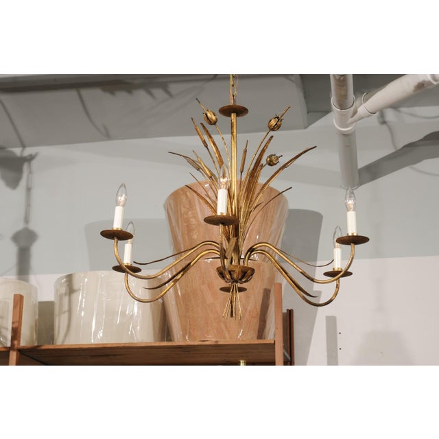 This elegant bulrush toleware chandelier has a beautiful hand applied gold leaf finish which has aged beautifully....