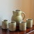 Offering a lovely vintage stoneware pitcher and four matching tumblers. This beautiful hand-thrown artisanal set features...