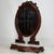 An exceptional 19th-century dressing mirror, beautifully crafted from mahogany and distinguished by its extensively carved...