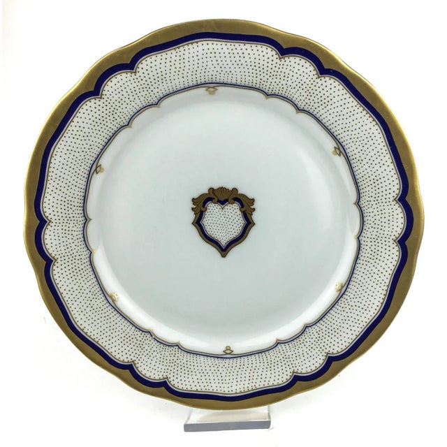Complete with holes for hanging on the wall, this beautiful plate was produced by the Danbury Mint in West Germany of Gold...