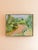 Oil landscape of a winding dirt road through bright green hills and trees under a grey-blue sky, in broad, gestural...