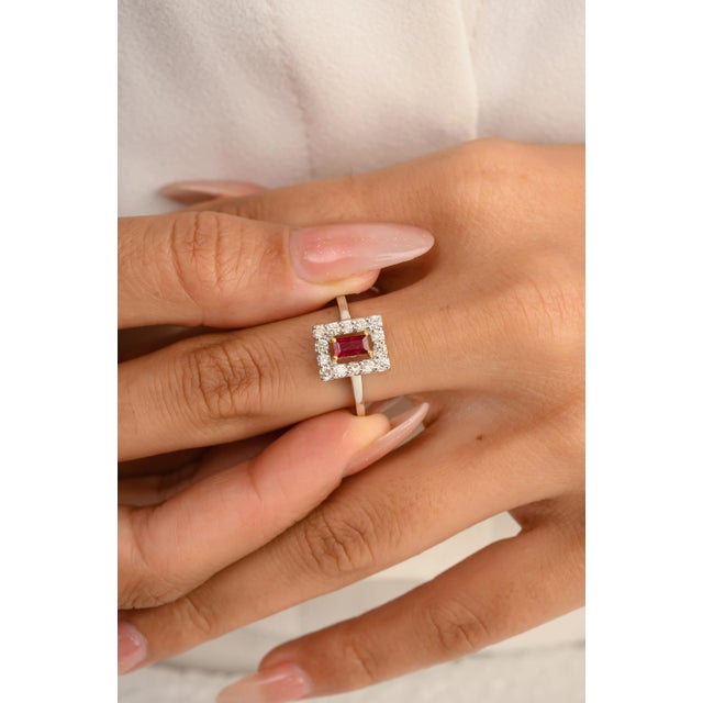 This is part of Chairish’s Fine Jewelry assortment. Dainty Baguette Ruby Halo Diamond Ring Gift for Girlfriend in 14K Gold...