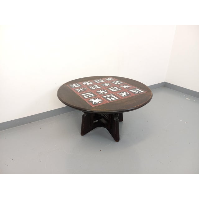 Vintage round coffee table from the 1950s and 1960s, adjustable into a dining or game table by lifting it 22 cm, known as...