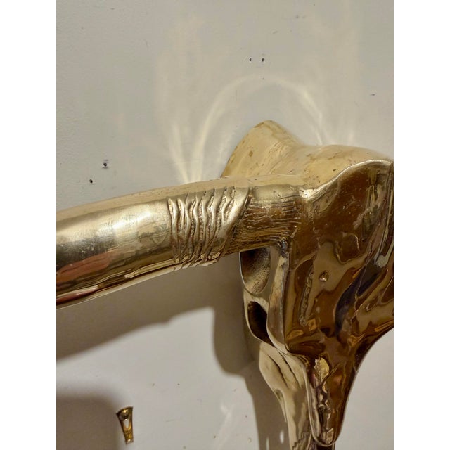 Extra Large 31" Hollywood Regency style brass longhorn skull wall sculpture. Hand polished, light and dark spots are...