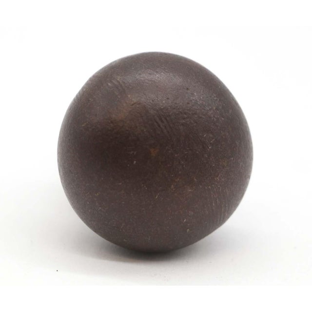 Ball shaped cabinet or drawer knob made of bronze with a dark bronze finish. Mounting screws are included. Good condition....